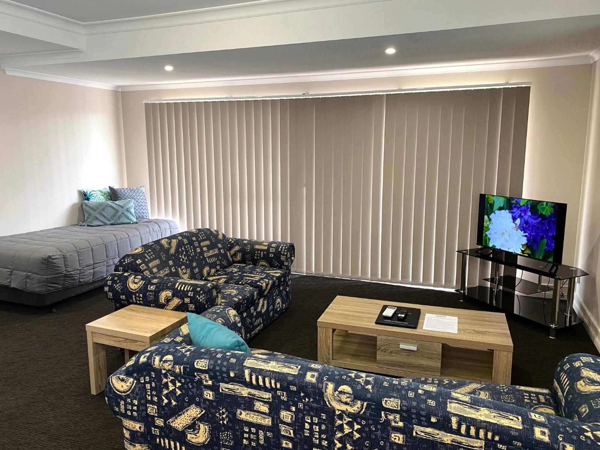 Cityville Apartamentos de lujo&Motel Rockhampton Habitación foto